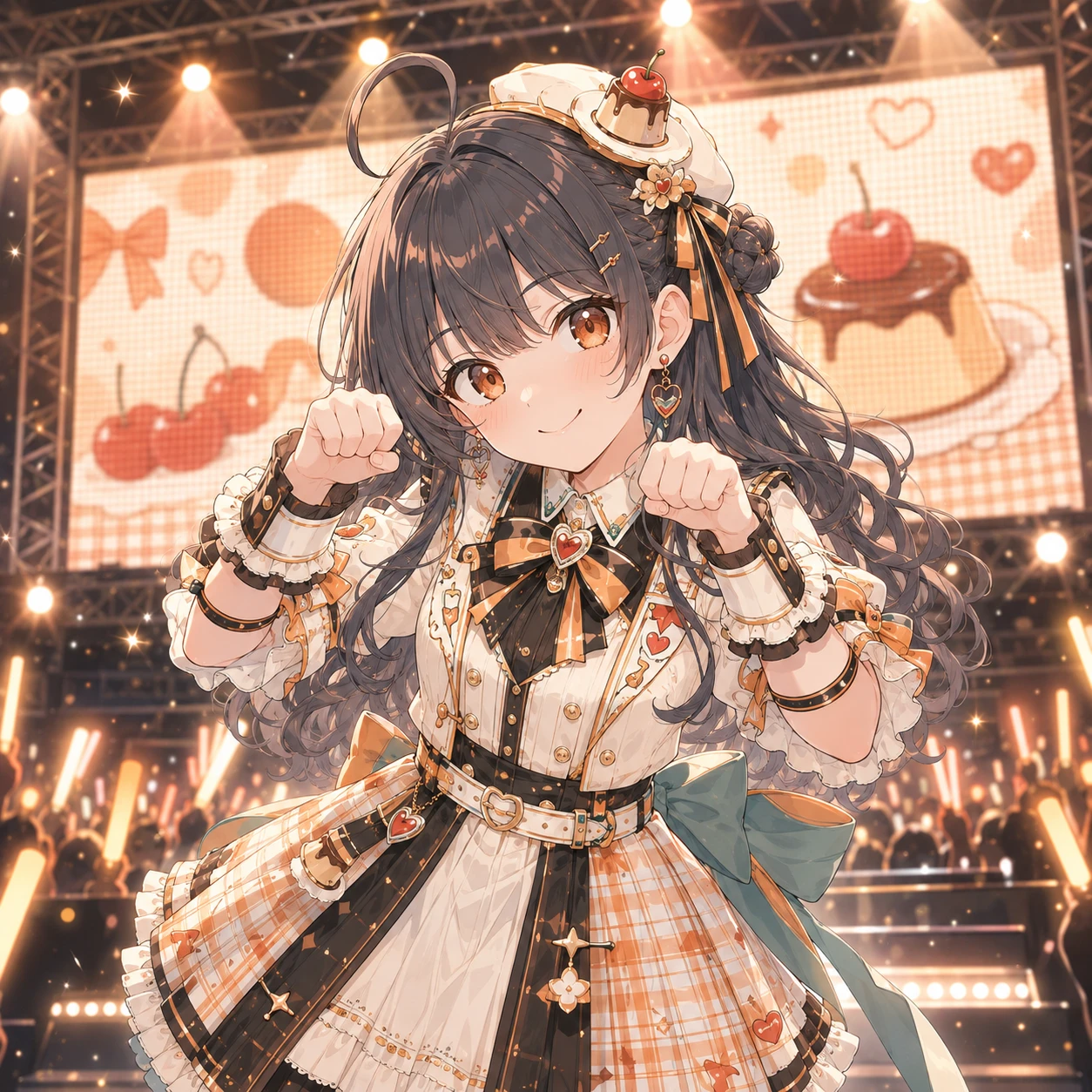 プリンとさくらんぼの映像を背に、ステージでポーズを取るプリンちゃん